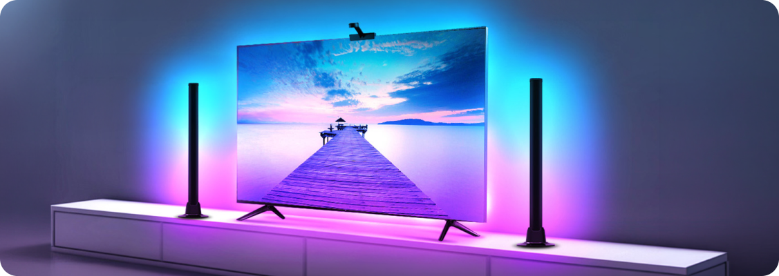 Professional Spacetronik TV backlighting system with image synchronization installed behind a TV in a modern living room.