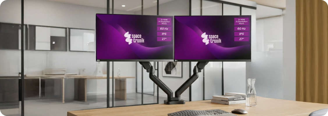Modern, ergonomic workstation with a Spacetronik adjustable desk, monitor, keyboard, and mouse, symbolizing comfort and productivity