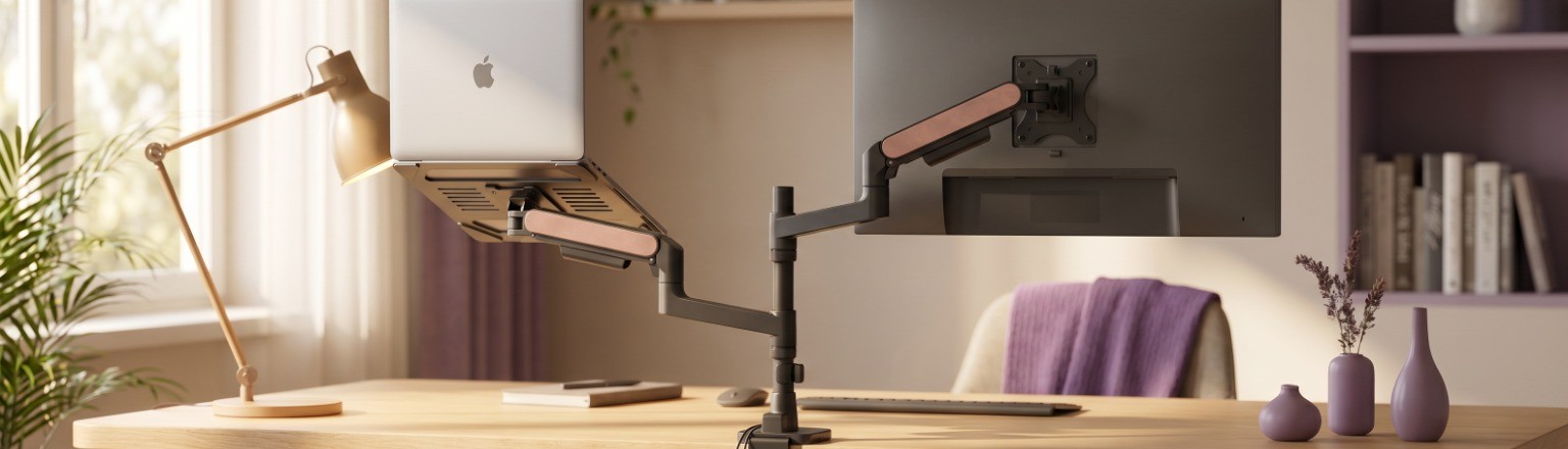 Eleganckie ramię do monitora i laptopa Spacetronik SPAG131 w nowoczesnym biurze